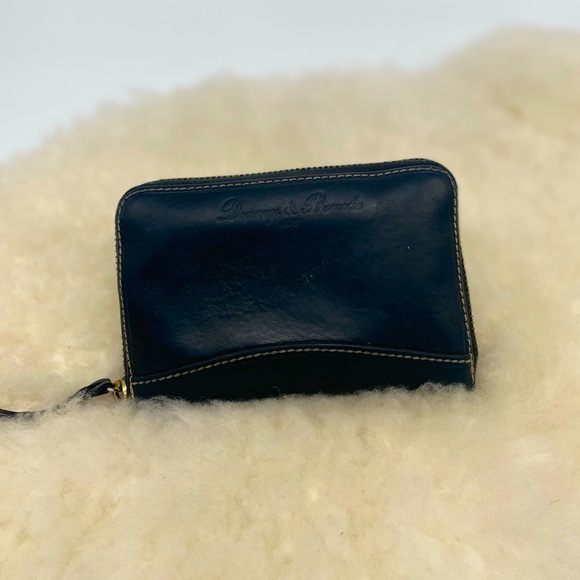 Dooney & Bourke Handbags - Dooney & bourke small black leather wallet with red lining
